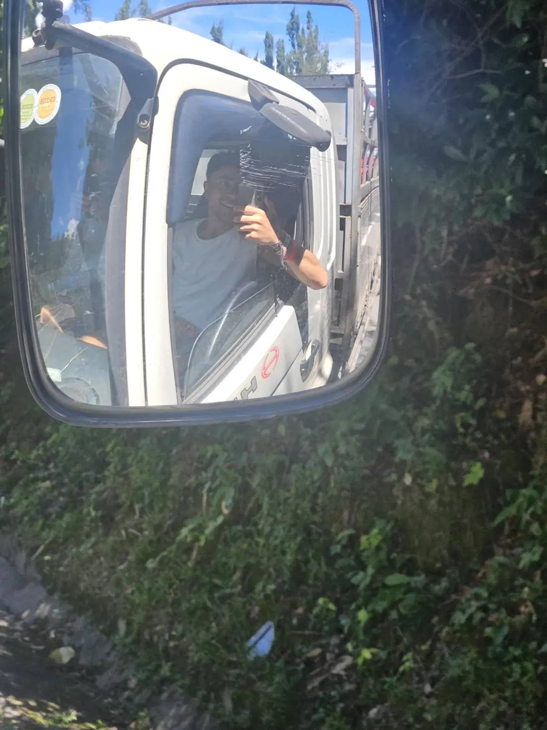Riding, seen in the wing mirror